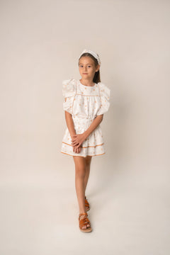 Conj. Blusa Olanes En Talle Y Falda Smock Filos Con Estrellas