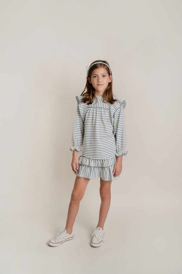 Conj. Blusa Olanes Y Picueta En Contraste Con Falda Medio Olan Rayas Tejido De Punto