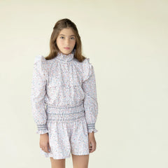 Conj. Blusa Isabel Flores/Detalle Bordado Con Falda Short Detalle En Peto Flores